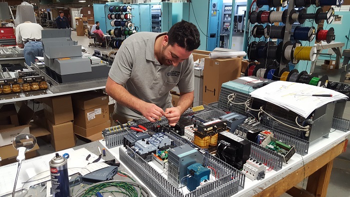 EDC employee Tom F happy at work